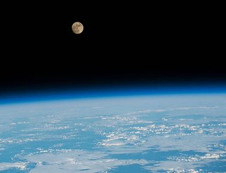 The waxing gibbous Moon above the Pacific Ocean